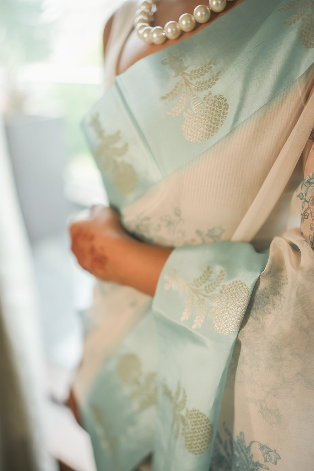 Elegant White and light Blue Organza saree with Floral Prints and Satin Border