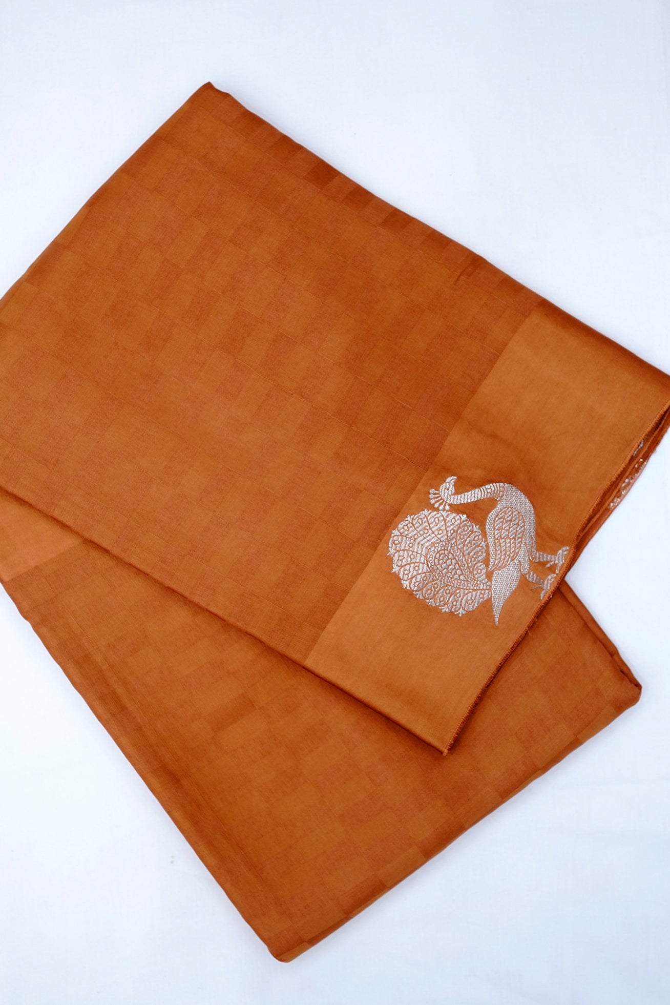 Orange peacock buta silk saree