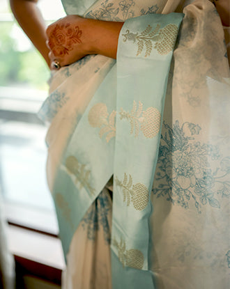 White-Blue Organza Saree with Floral Motifs and Satin Border