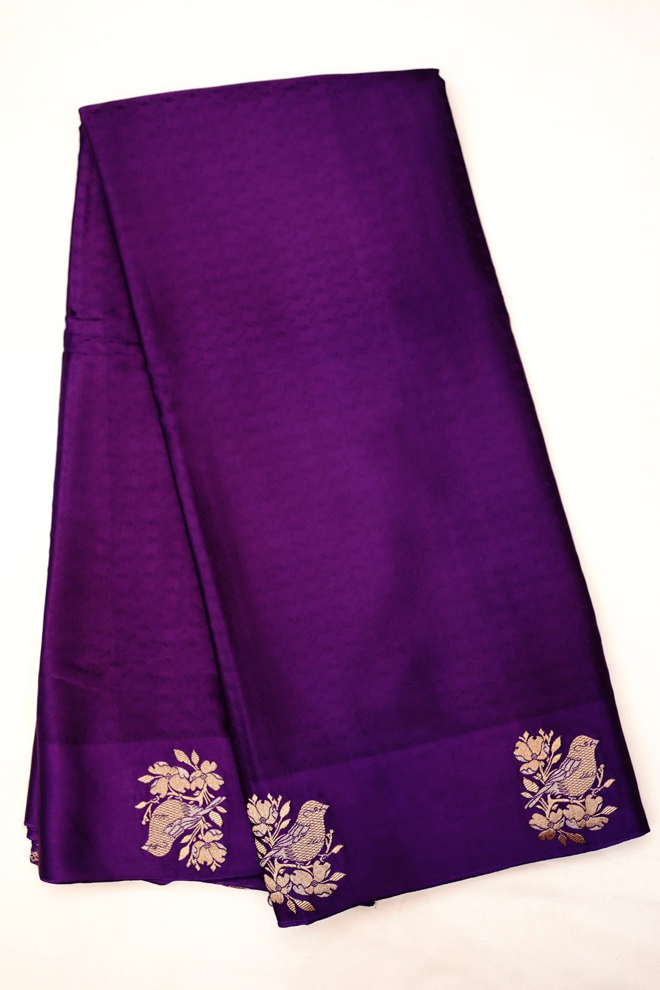 Vibrant purple bird print silk saree